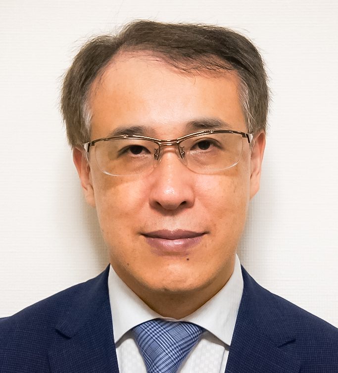 田賀　芳大 氏